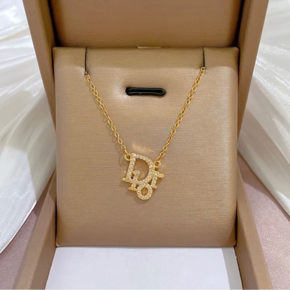 D.I.O. Gold-Tone Crystal Letter Pendant Necklace